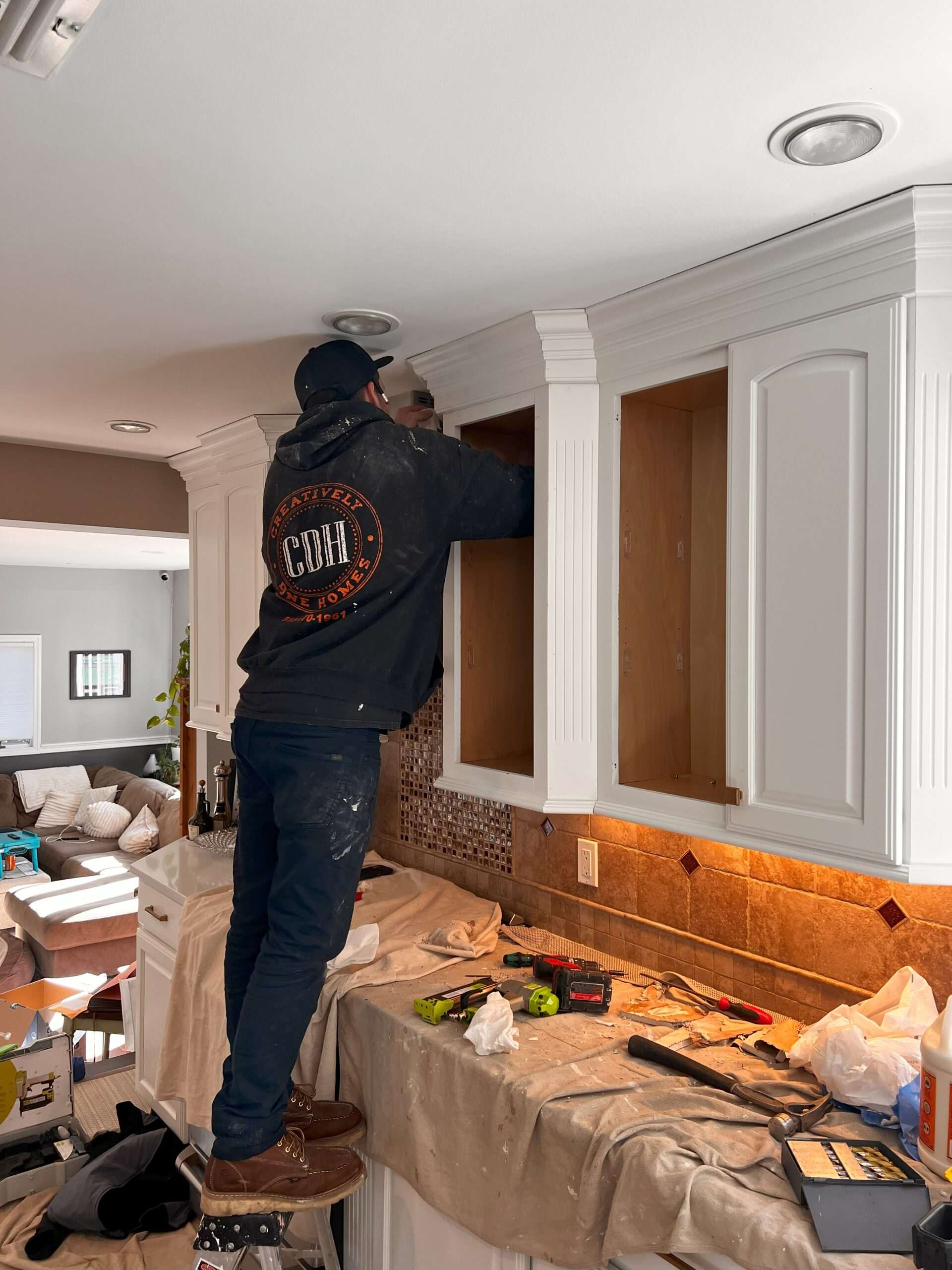 Home-Remodeling-Syosset-NY-Kitchen-Installation-Matthew-Creatively-Done - Creatively Done Homes Improvements Inc. Matthew from Creatively Done Homes Improvements During a Kitchen Installation in Syosset Ny