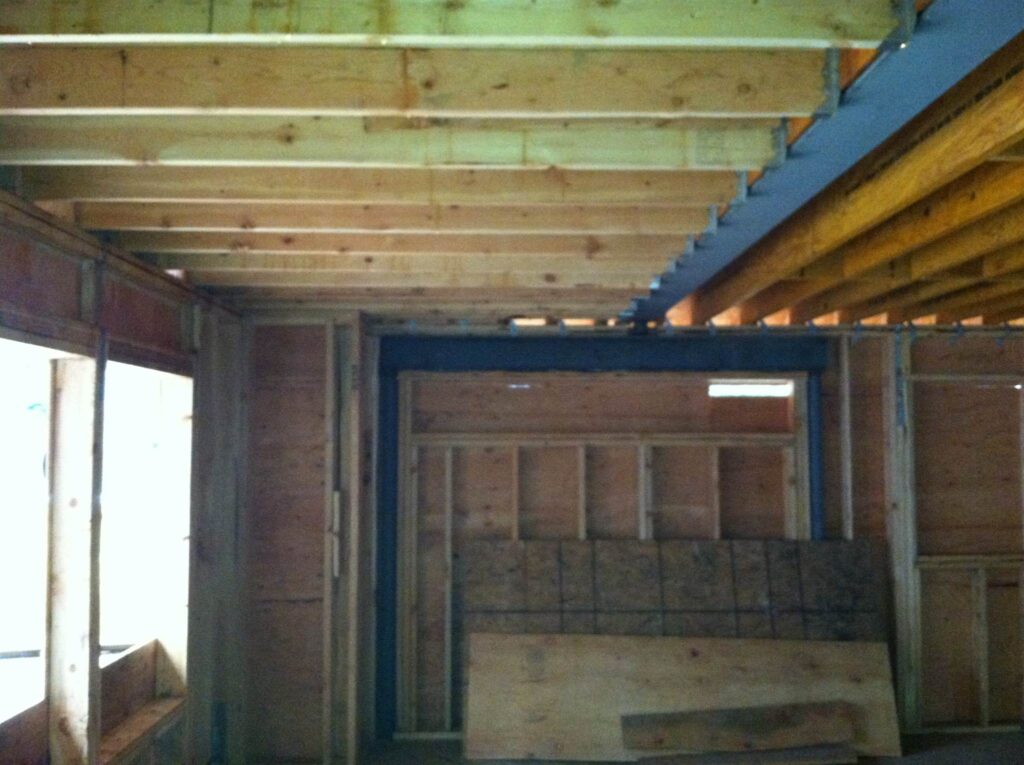 Load Bearing Wall Removal in Progress in Plainview Ny by Creatively Done Homes Improvements