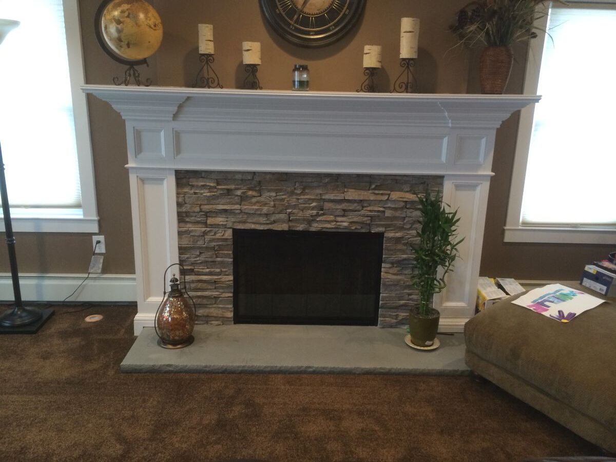 Traditional Fireplace Mantel Surround with Stacked Stone and Bluestone Hearth in Farmingdale Ny by Creatively Done Homes Improvements